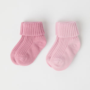 Two Pack Pink Baby Socks from the Polarn O. Pyret baby collection. Clothes made using sustainably sourced materials.