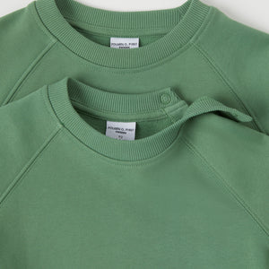 Green Kids Sweatshirt from Polarn O. Pyret kidswear. Clothes made using sustainably sourced materials.