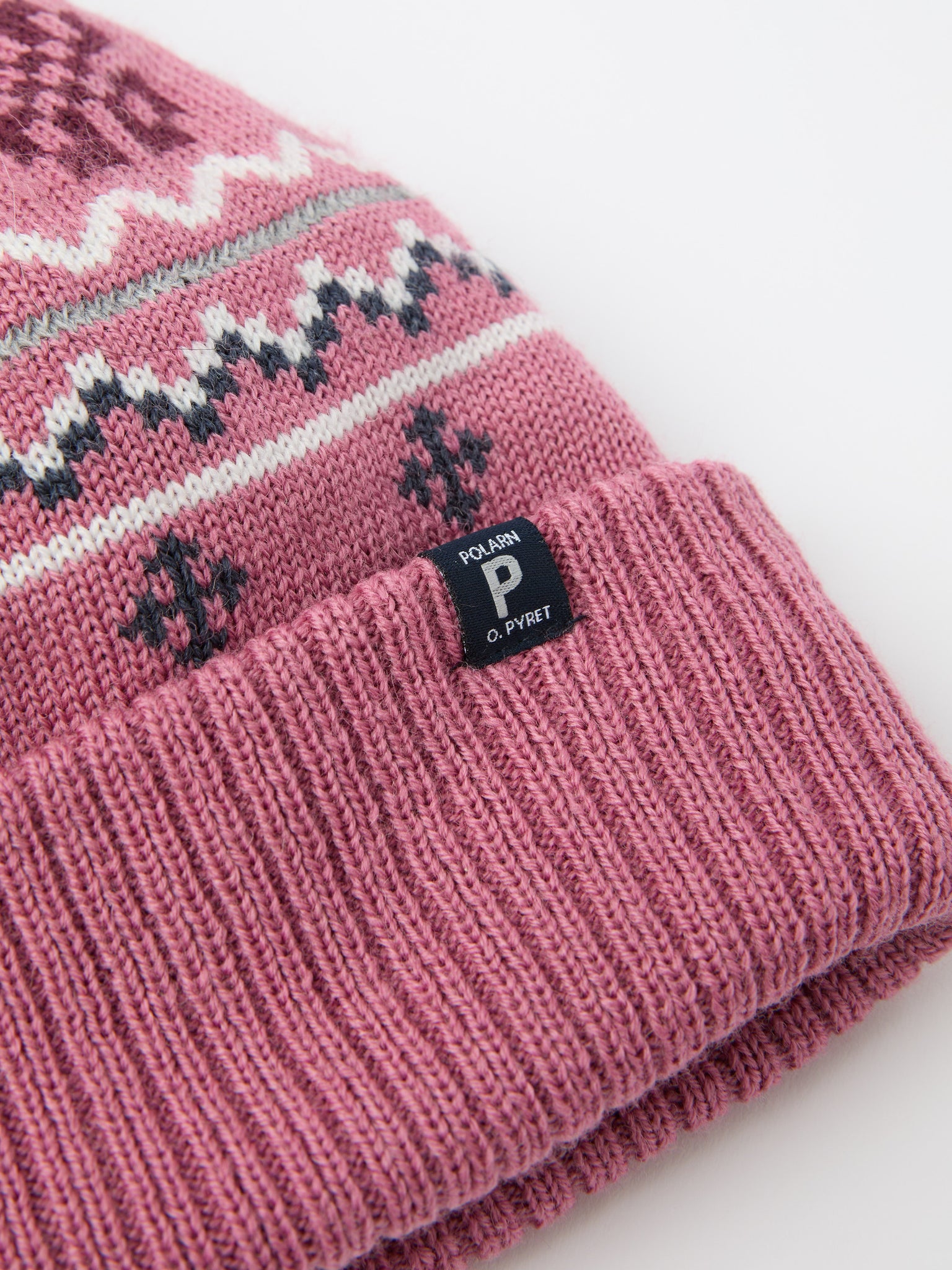 Pink Kids Nordic Bobble Hat from the Polarn O. Pyret kidswear collection. Quality kids clothing made to last.