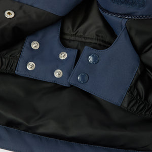 Navy Padded Kids Ski Jackets from the Polarn O. Pyret kidswear collection. The best ethical kids outerwear.