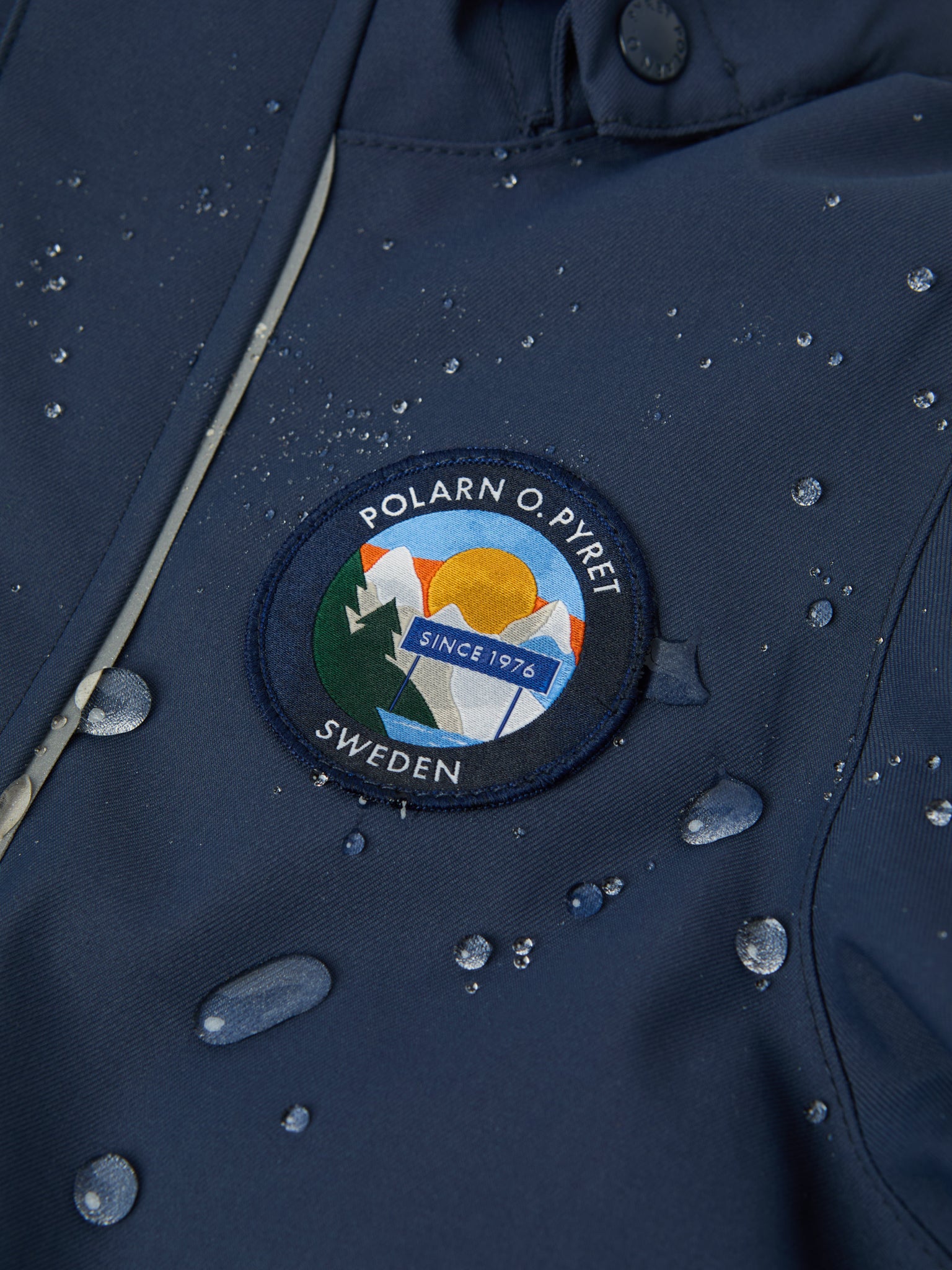 Navy Padded Kids Ski Jackets from the Polarn O. Pyret kidswear collection. The best ethical kids outerwear.