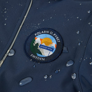 Navy Padded Kids Ski Jackets from the Polarn O. Pyret kidswear collection. The best ethical kids outerwear.