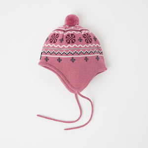 Pink Merino Wool Kids Bobble Hat from the Polarn O. Pyret kidswear collection. Ethically produced kids outerwear.