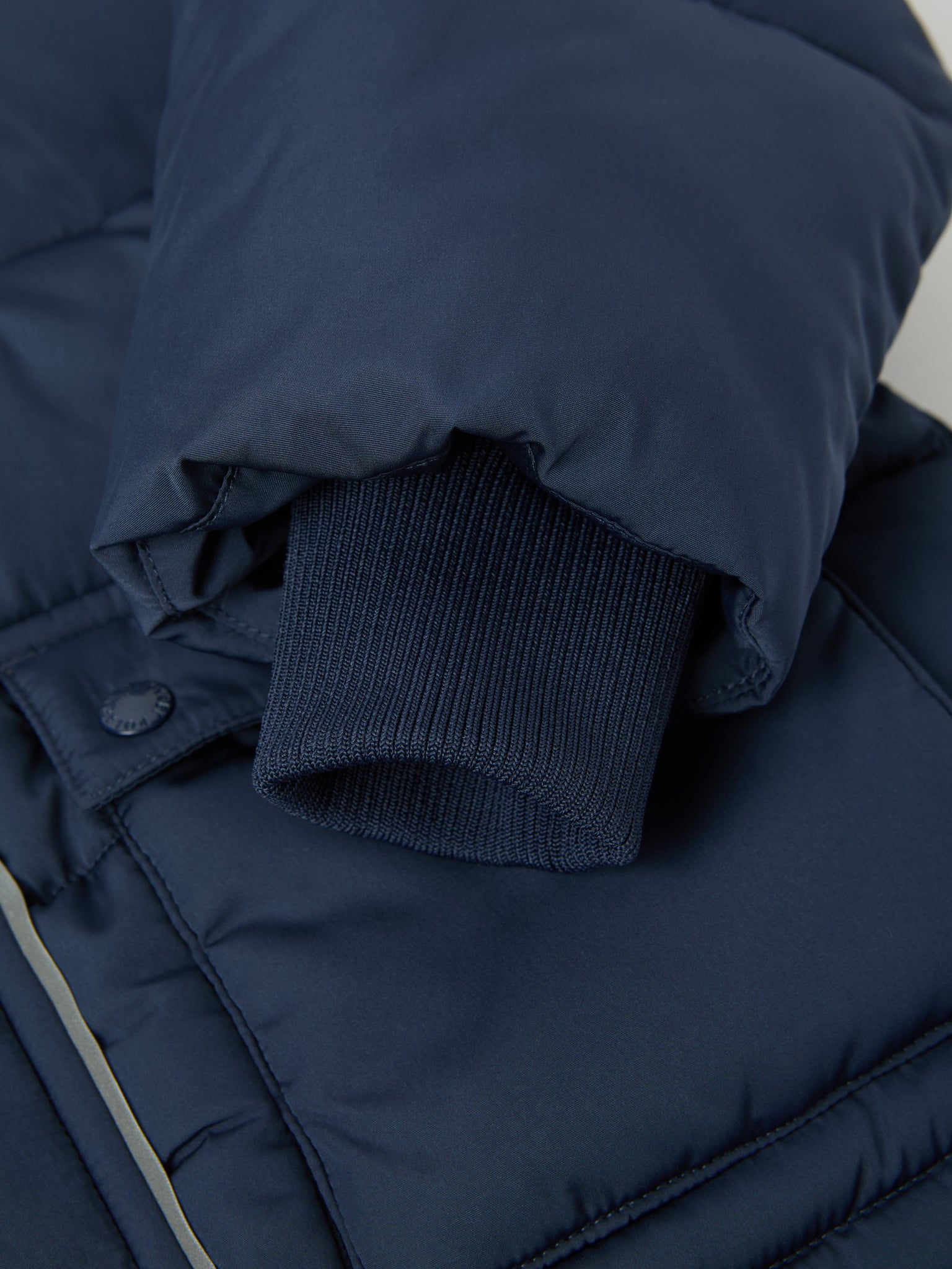 Navy Padded Water Resistant Kids Coat from the Polarn O. Pyret kidswear collection. The best ethical kids outerwear.