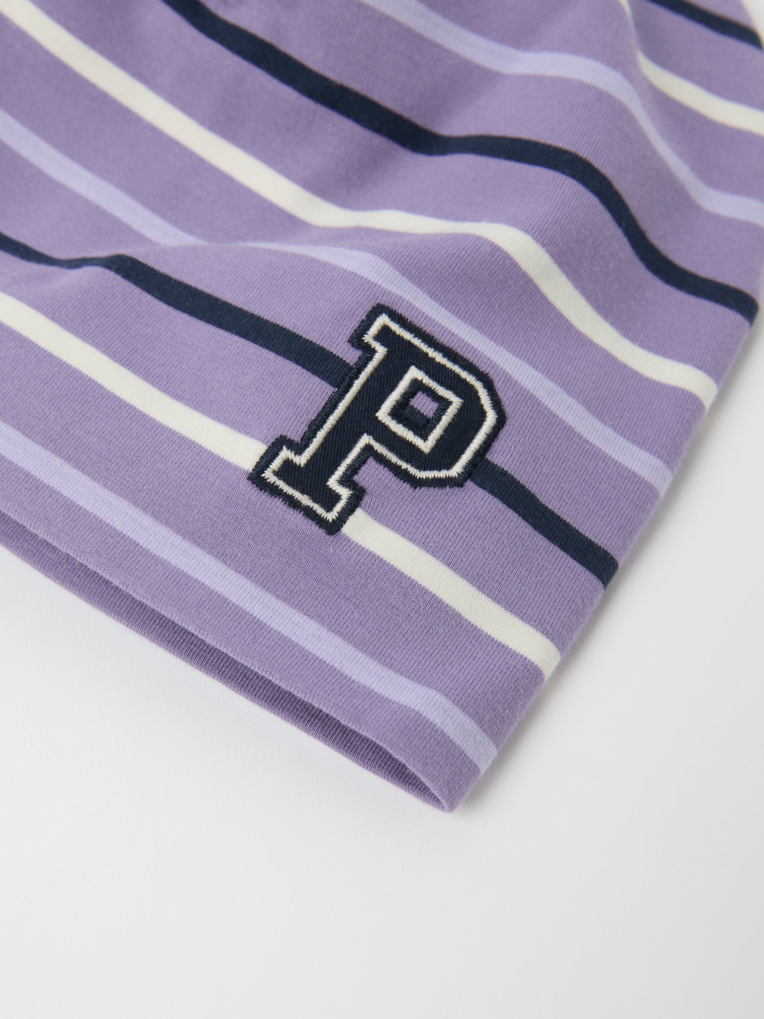 Purple Striped Kids Beanie Hat from the Polarn O. Pyret kidswear collection. Ethically produced kids outerwear.