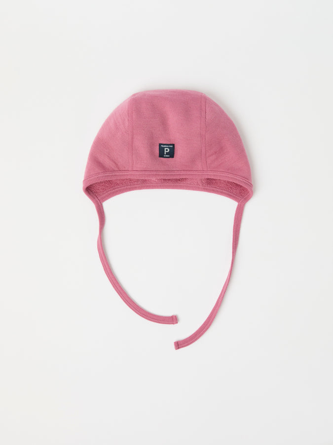 Pink Merino Wool Baby Helmet Hat from the Polarn O. Pyret kidswear collection. The best ethical kids outerwear.