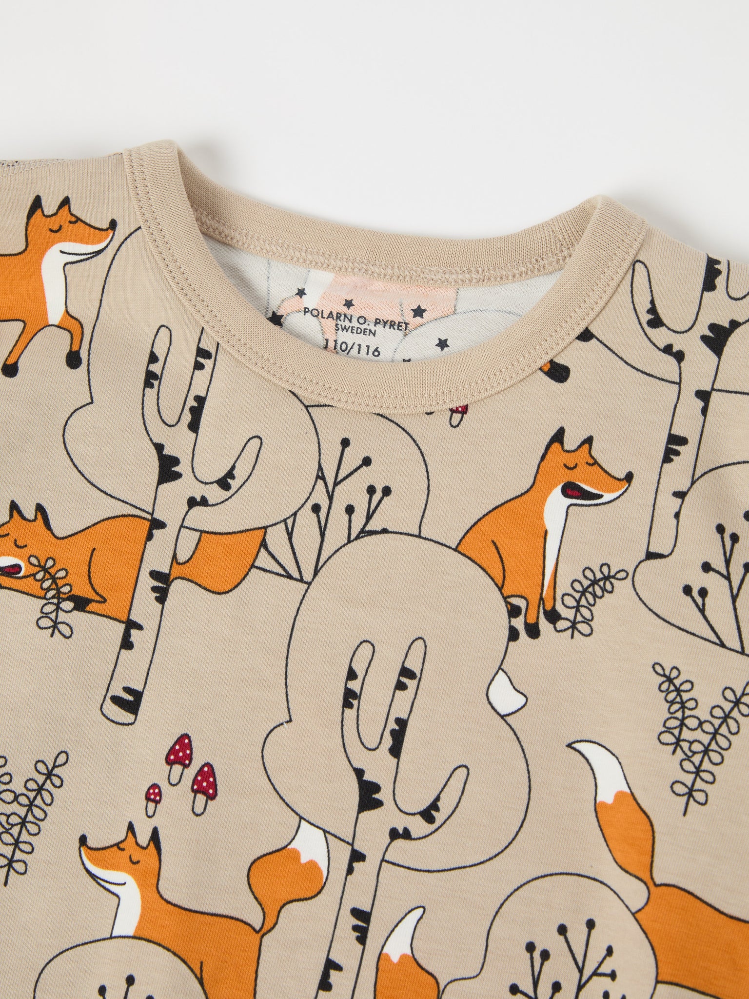 Fox Print Kids Pyjamas from the Polarn O. Pyret kidswear collection. Nordic kids clothes made from sustainable sources.