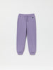 Purple Organic Cotton Kids Joggers from the Polarn O. Pyret kidswear collection. Nordic kids clothes made from sustainable sources.