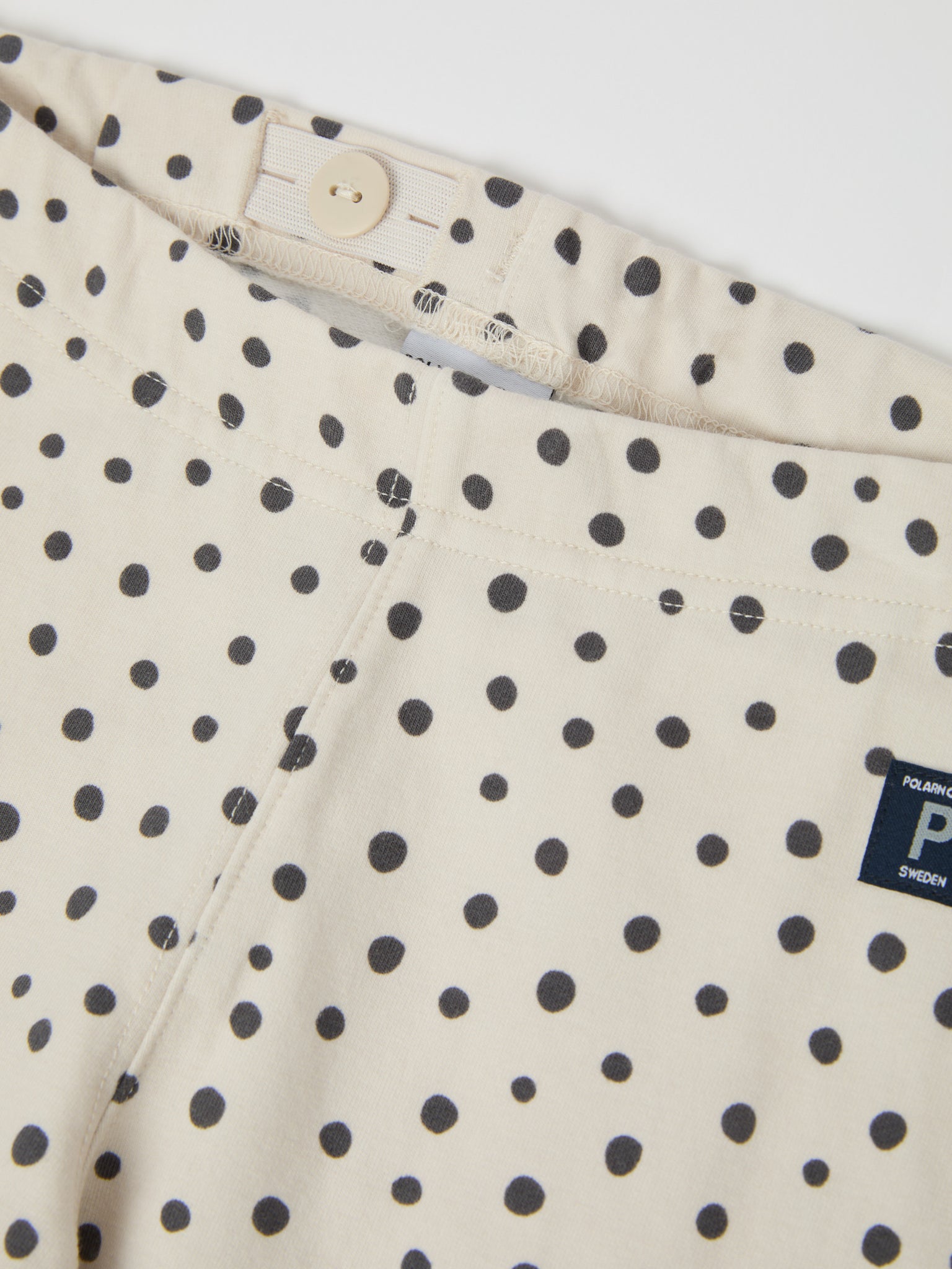 Polka Dot Print Kids Leggings from the Polarn O. Pyret kidswear collection. Ethically produced kids clothing.