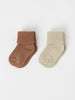 Beige Two Pack Baby Socks from the Polarn O. Pyret baby collection. Clothes made using sustainably sourced materials.