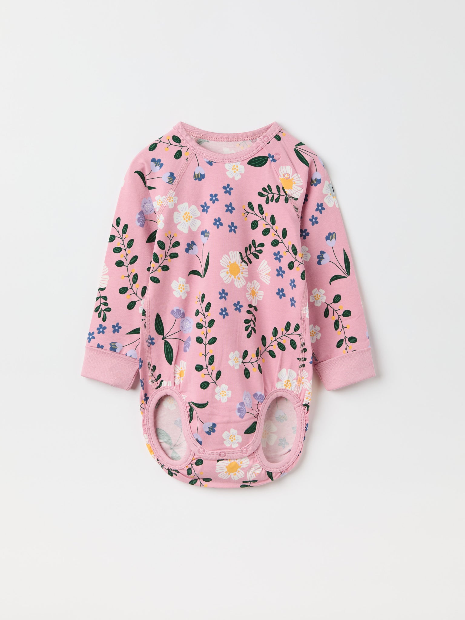 Floral Print Organic Babygrow from the Polarn O. Pyret baby collection. Clothes made using sustainably sourced materials.