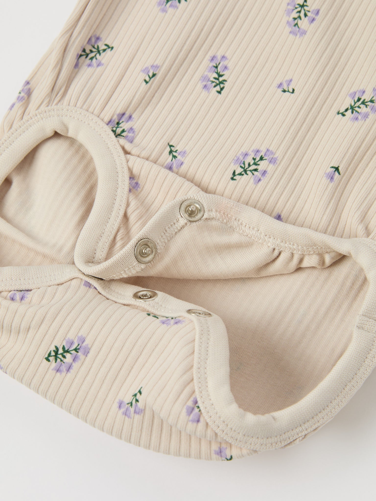 Ribbed Floral Print Organic Babygrow from the Polarn O. Pyret baby collection. Nordic kids clothes made from sustainable sources.