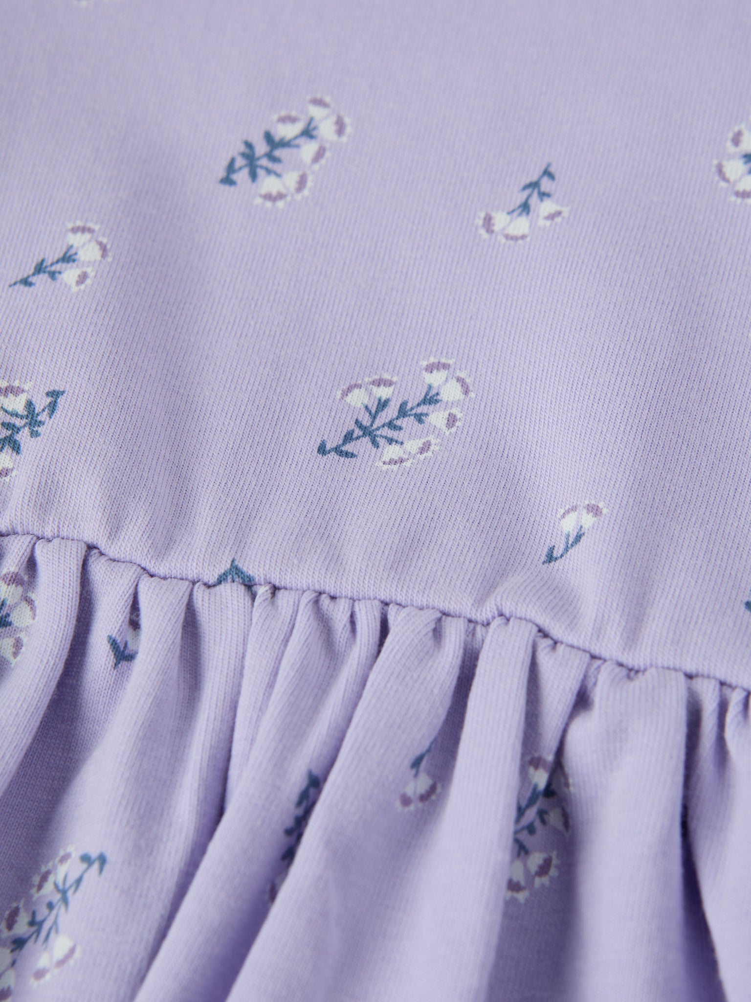 Purple Floral Print Babygrow Dress from the Polarn O. Pyret baby collection. Ethically produced kids clothing.