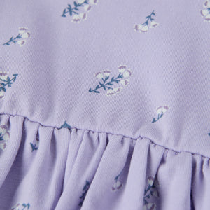 Purple Floral Print Babygrow Dress from the Polarn O. Pyret baby collection. Ethically produced kids clothing.