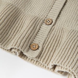 Beige Cotton Frilled Baby Cardigan from the Polarn O. Pyret baby collection. The best ethical kids clothes