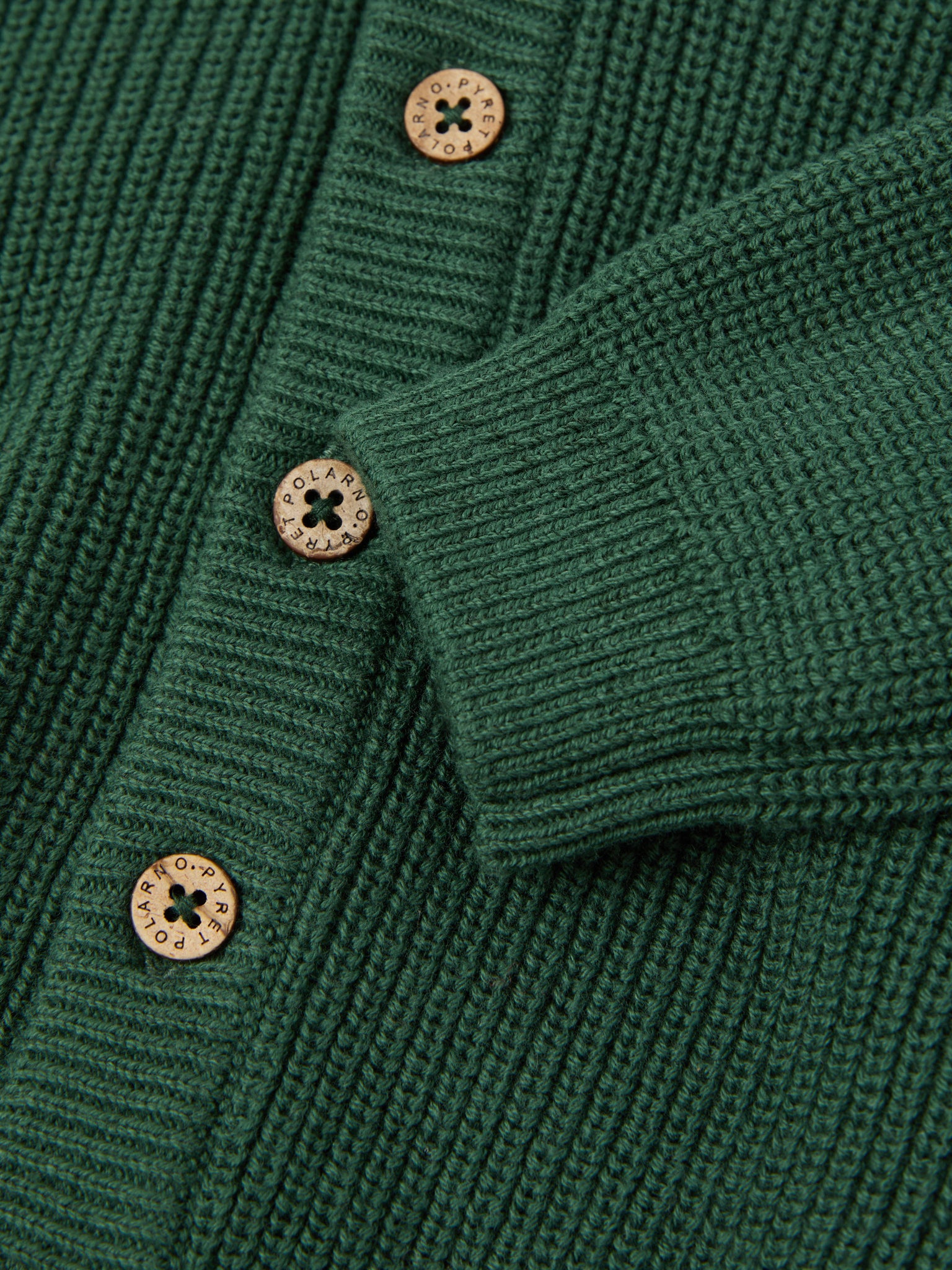 Green Cotton Knitted Baby Hoodie from the Polarn O. Pyret baby collection. Nordic kids clothes made from sustainable sources.