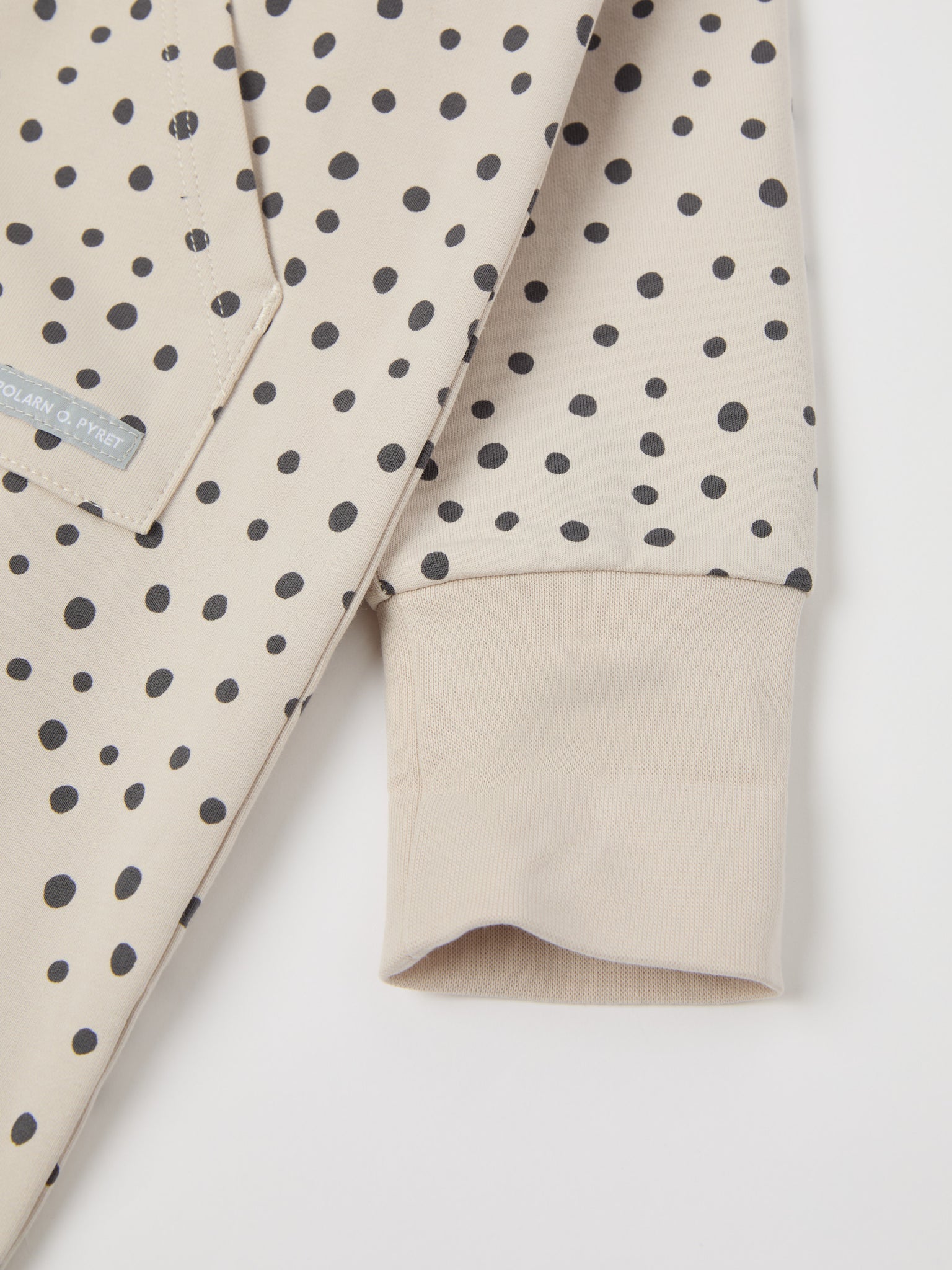 Polka Dot Print Organic Baby All-in-one from the Polarn O. Pyret baby collection. Nordic kids clothes made from sustainable sources.