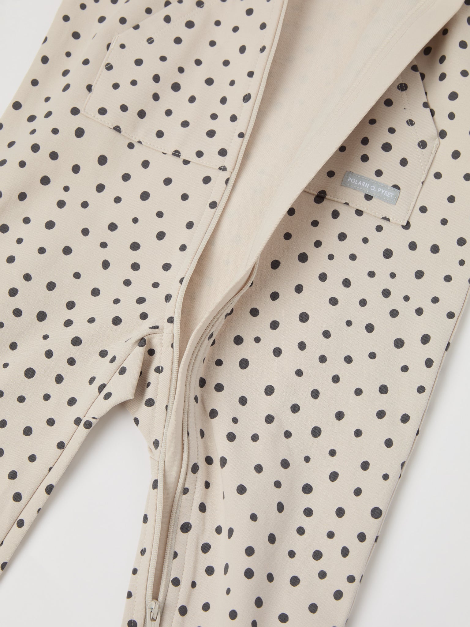 Polka Dot Print Organic Baby All-in-one from the Polarn O. Pyret baby collection. Nordic kids clothes made from sustainable sources.