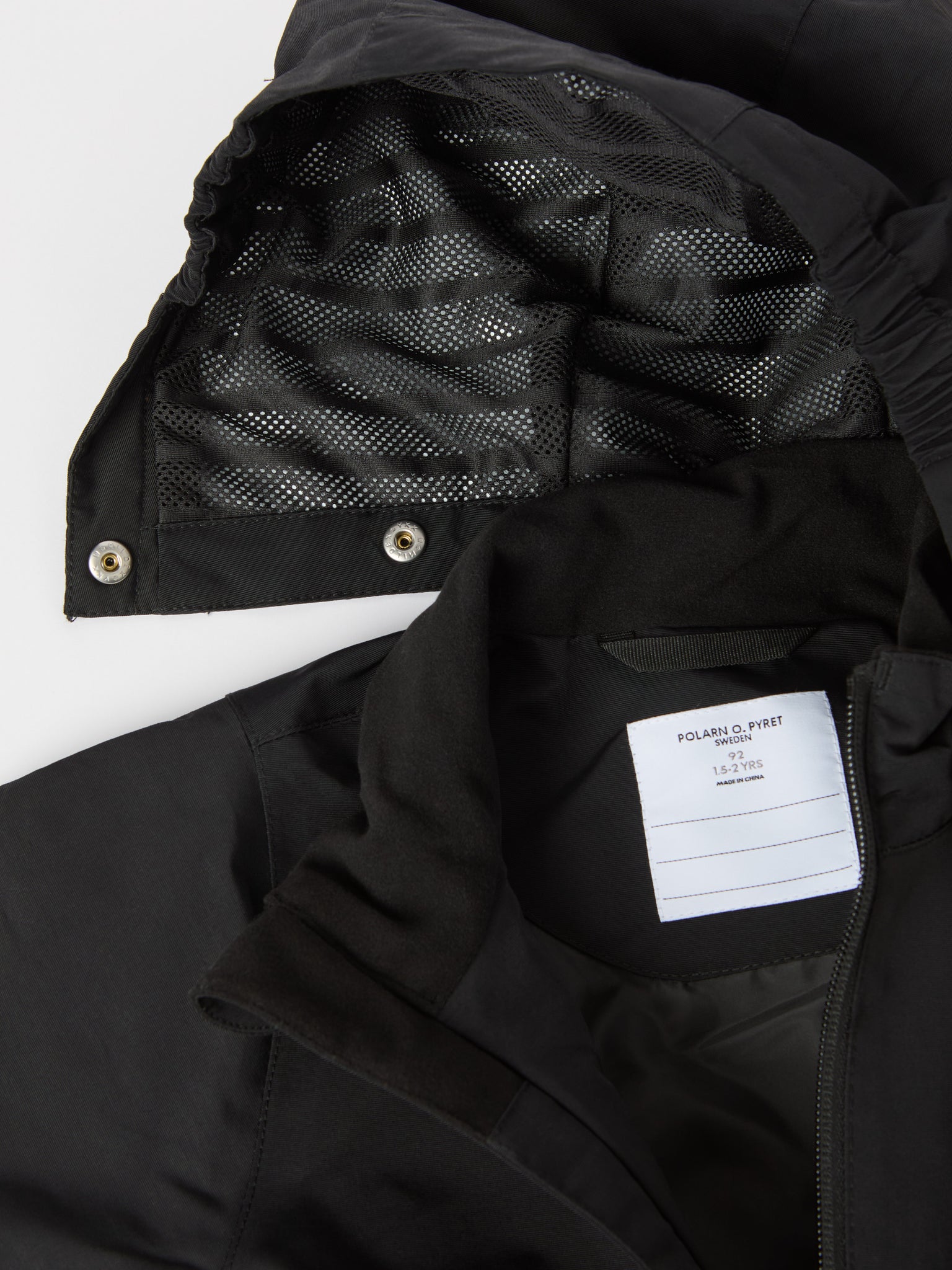 Black Recycled Kids Puddle Suit from the Polarn O. Pyret kidswear collection. Ethically produced kids outerwear.