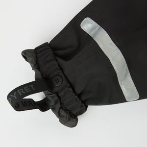 Black Recycled Kids Puddle Suit from the Polarn O. Pyret kidswear collection. Ethically produced kids outerwear.