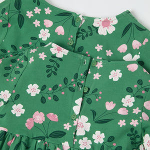 Green Floral Print Kids Dress from the Polarn O. Pyret kidswear collection. Nordic kids clothes made from sustainable sources.