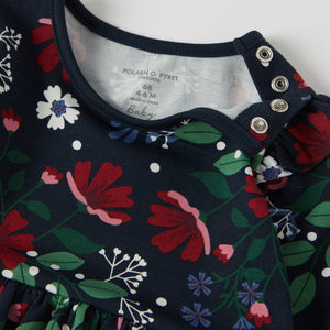 Floral Print Babygrow Dress from the Polarn O. Pyret baby collection. Clothes made using sustainably sourced materials.