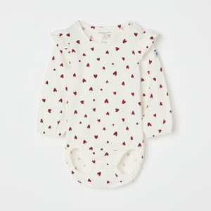 Organic Cotton Heart Print Babygrow from the Polarn O. Pyret baby collection. Ethically produced kids clothing.