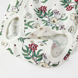 Floral Print Wraparound Babygrow from the Polarn O. Pyret baby collection. Clothes made using sustainably sourced materials.