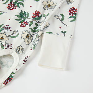 Floral Print Wraparound Babygrow from the Polarn O. Pyret baby collection. Clothes made using sustainably sourced materials.