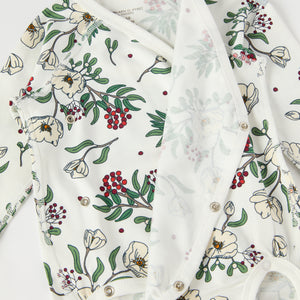 Floral Print Wraparound Babygrow from the Polarn O. Pyret baby collection. Clothes made using sustainably sourced materials.