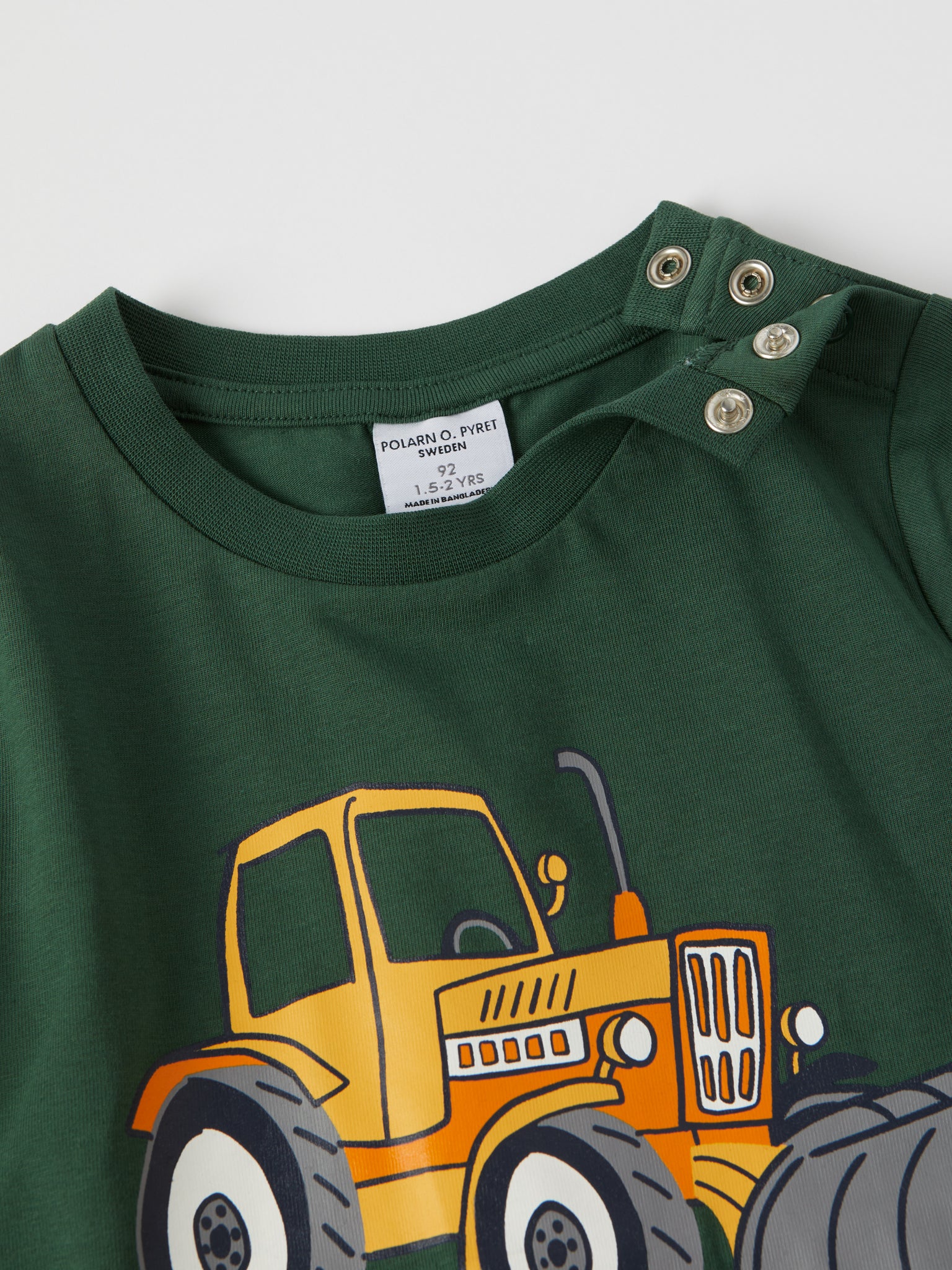 Tractor Print Cotton Kids Top from the Polarn O. Pyret kidswear collection. Nordic kids clothes made from sustainable sources.