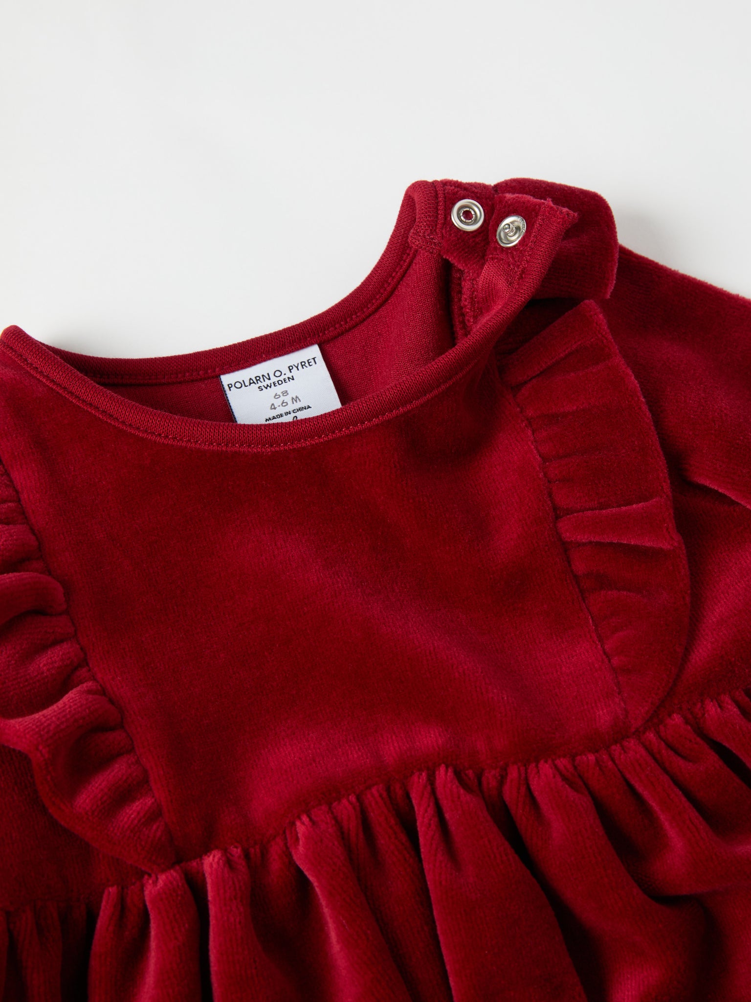 Organic Cotton Velour Dress from the Polarn O. Pyret baby collection. Clothes made using sustainably sourced materials.