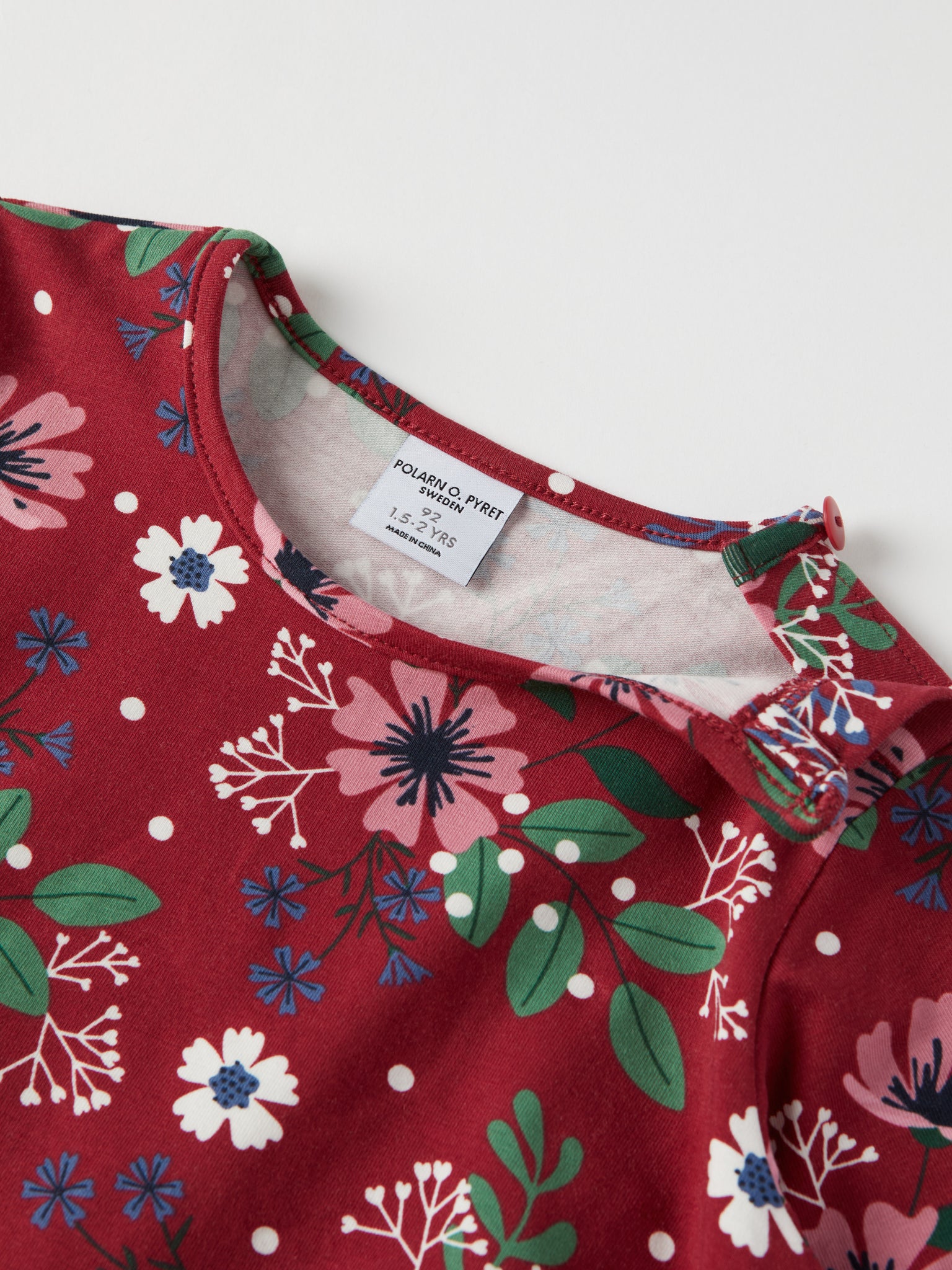 Red Floral Print Kids Top from the Polarn O. Pyret kidswear collection. Clothes made using sustainably sourced materials.