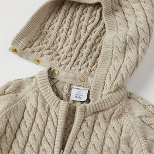 Cable Knit Baby Hooded All-in-one from the Polarn O. Pyret baby collection. Nordic kids clothes made from sustainable sources.