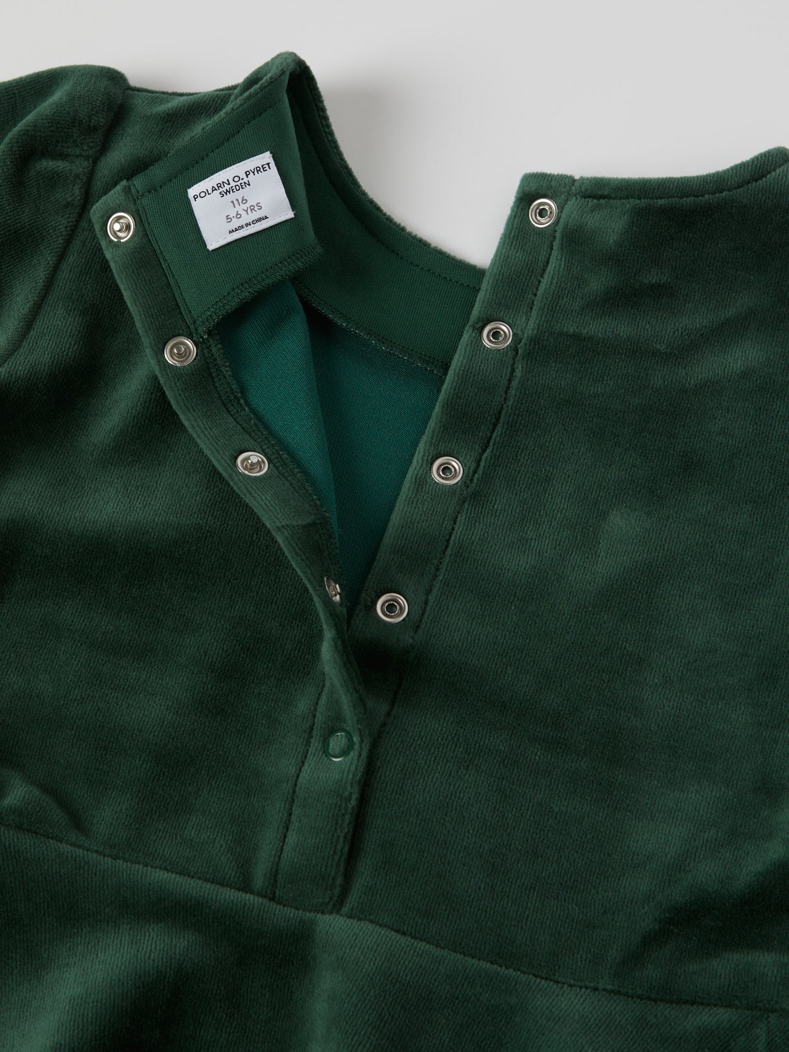 Green Velour Kids Dress from the Polarn O. Pyret kidswear collection. Nordic kids clothes made from sustainable sources.