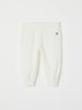 White Velour Baby Trousers from the Polarn O. Pyret baby collection. Nordic kids clothes made from sustainable sources.