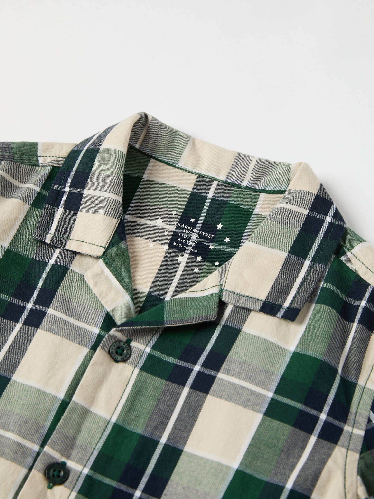 Checked Kids Pyjamas from the Polarn O. Pyret kidswear collection. Nordic kids clothes made from sustainable sources.