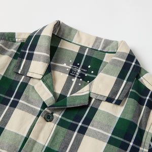 Checked Kids Pyjamas from the Polarn O. Pyret kidswear collection. Nordic kids clothes made from sustainable sources.