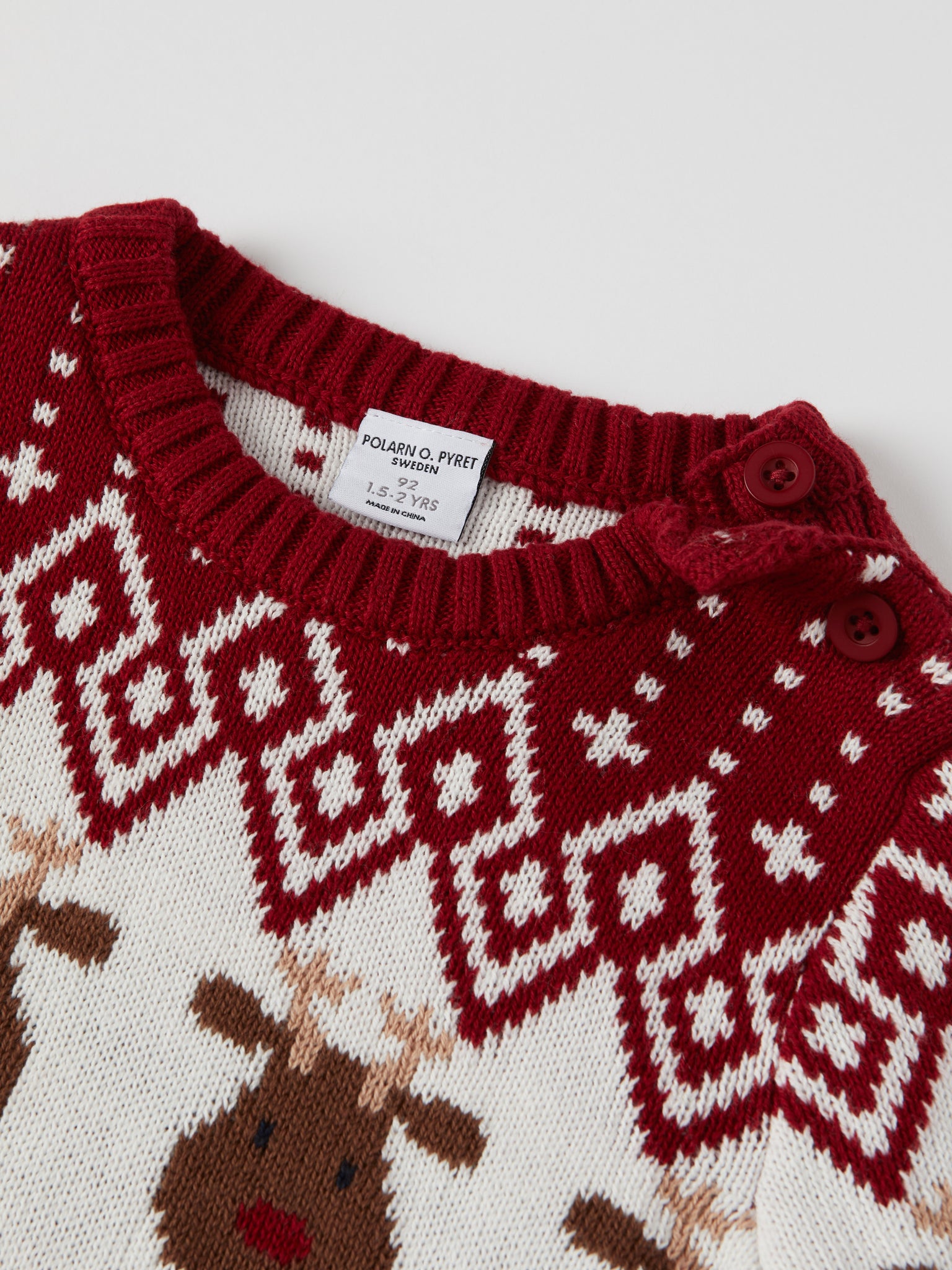 Red Reindeer Fairisle Kids Jumper from the Polarn O. Pyret kidswear collection. Nordic kids clothes made from sustainable sources.