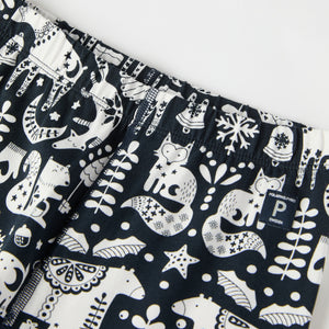 Nordic Christmas Print Kids Pyjamas from the Polarn O. Pyret kidswear collection. Ethically produced kids clothing.