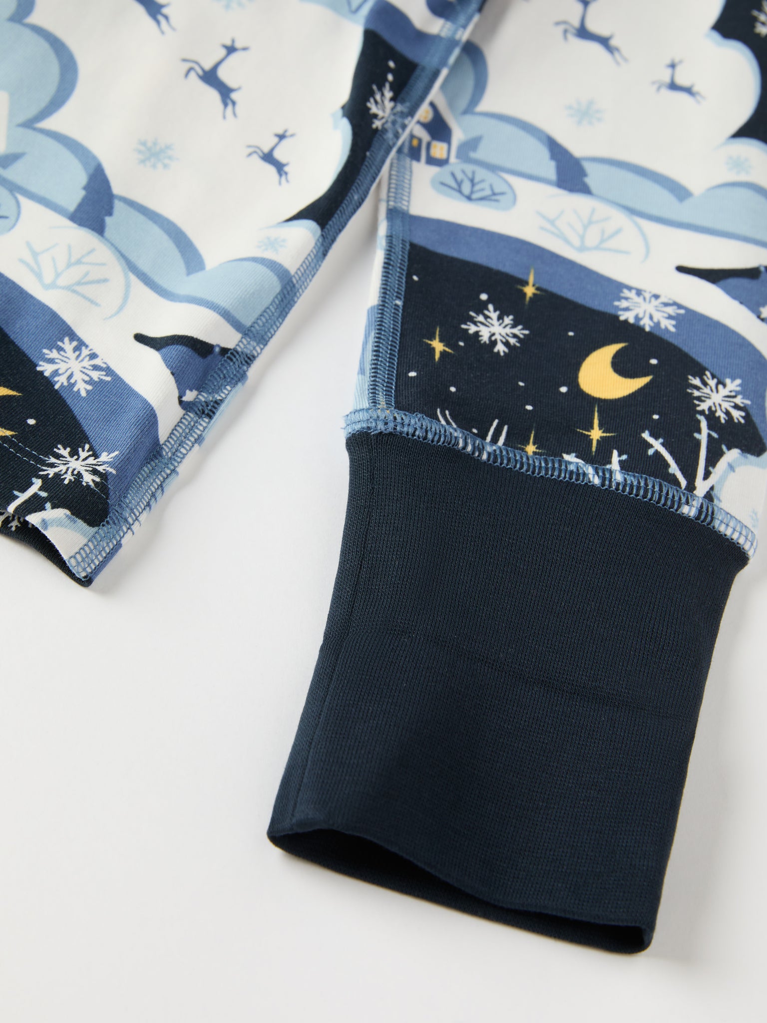 Winter Forest Print Kids Pyjamas from the Polarn O. Pyret kidswear collection. Clothes made using sustainably sourced materials.