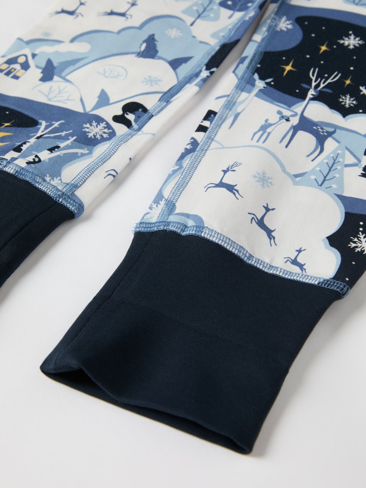 Winter Forest Print Kids Pyjamas from the Polarn O. Pyret kidswear collection. Clothes made using sustainably sourced materials.