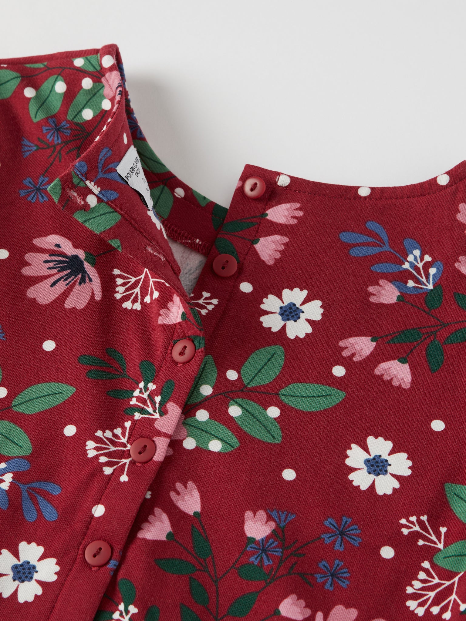 Festive Floral Print Kids Dress from the Polarn O. Pyret kidswear collection. Nordic kids clothes made from sustainable sources.