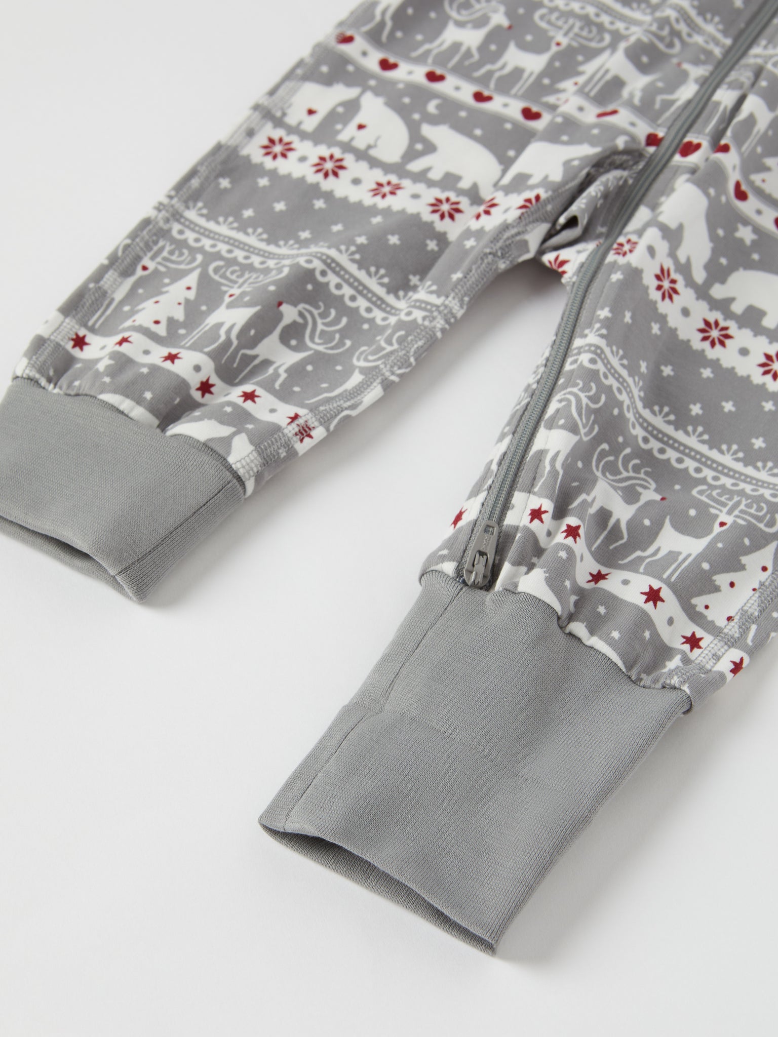 Nordic Christmas Print Baby Sleepsuit from the Polarn O. Pyret baby collection. Ethically produced kids clothing.