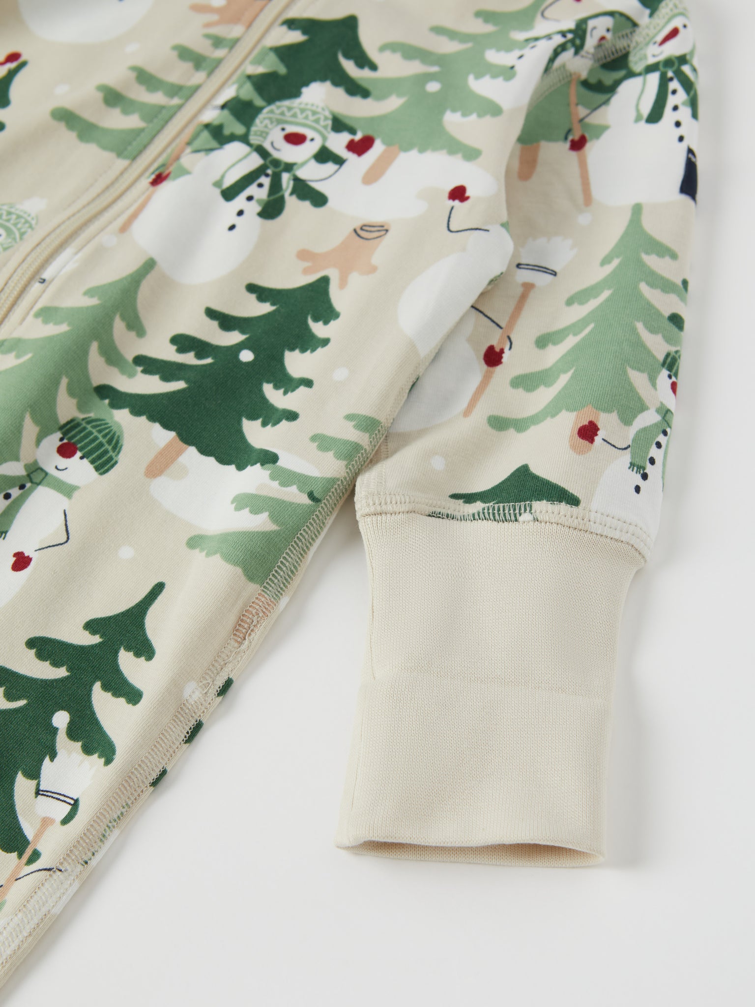 Nordic Forest Print Baby Sleepsuit from the Polarn O. Pyret baby collection. Clothes made using sustainably sourced materials.