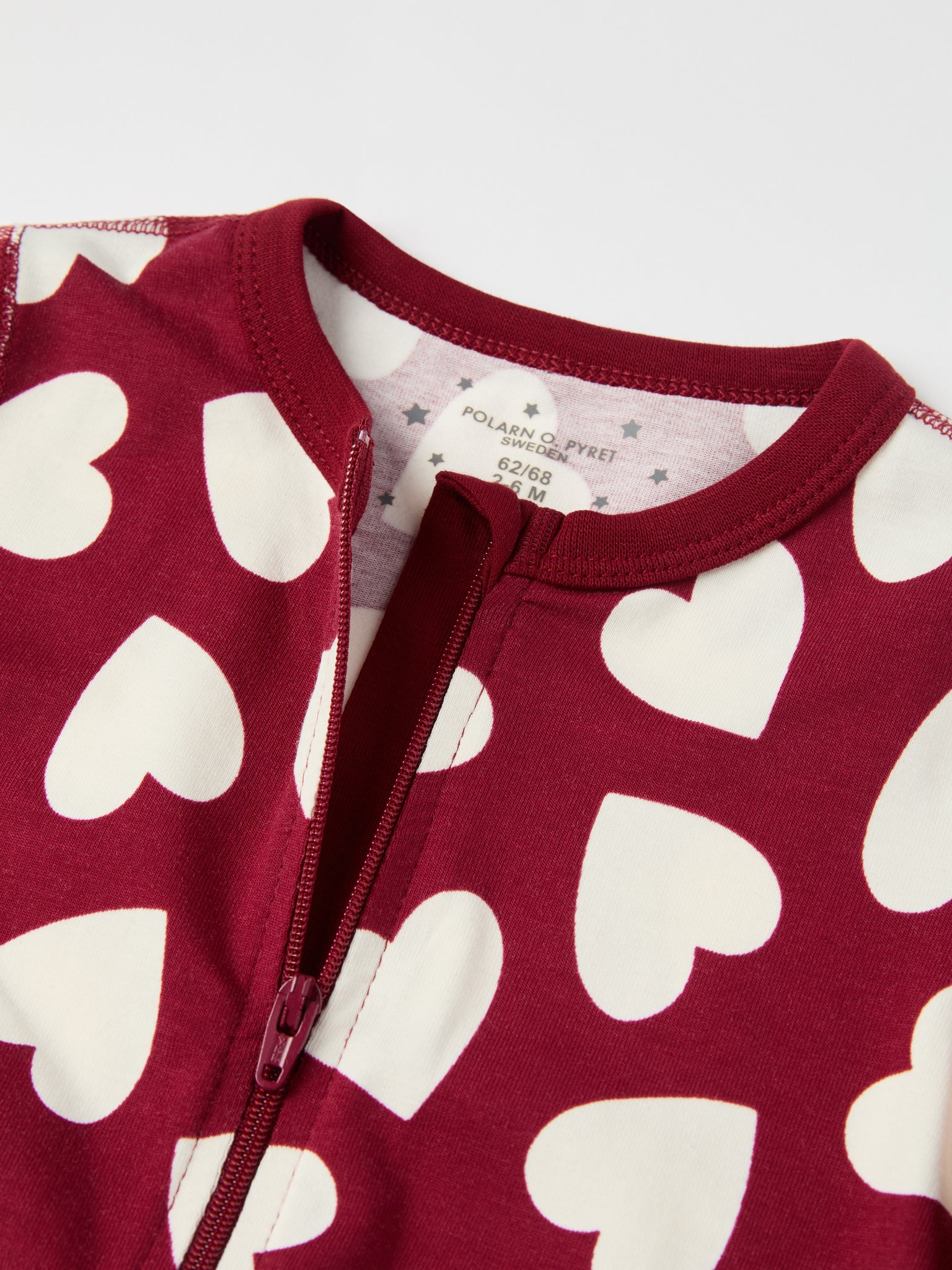 Heart Print Baby Sleepsuit from the Polarn O. Pyret baby collection. Ethically produced kids clothing.