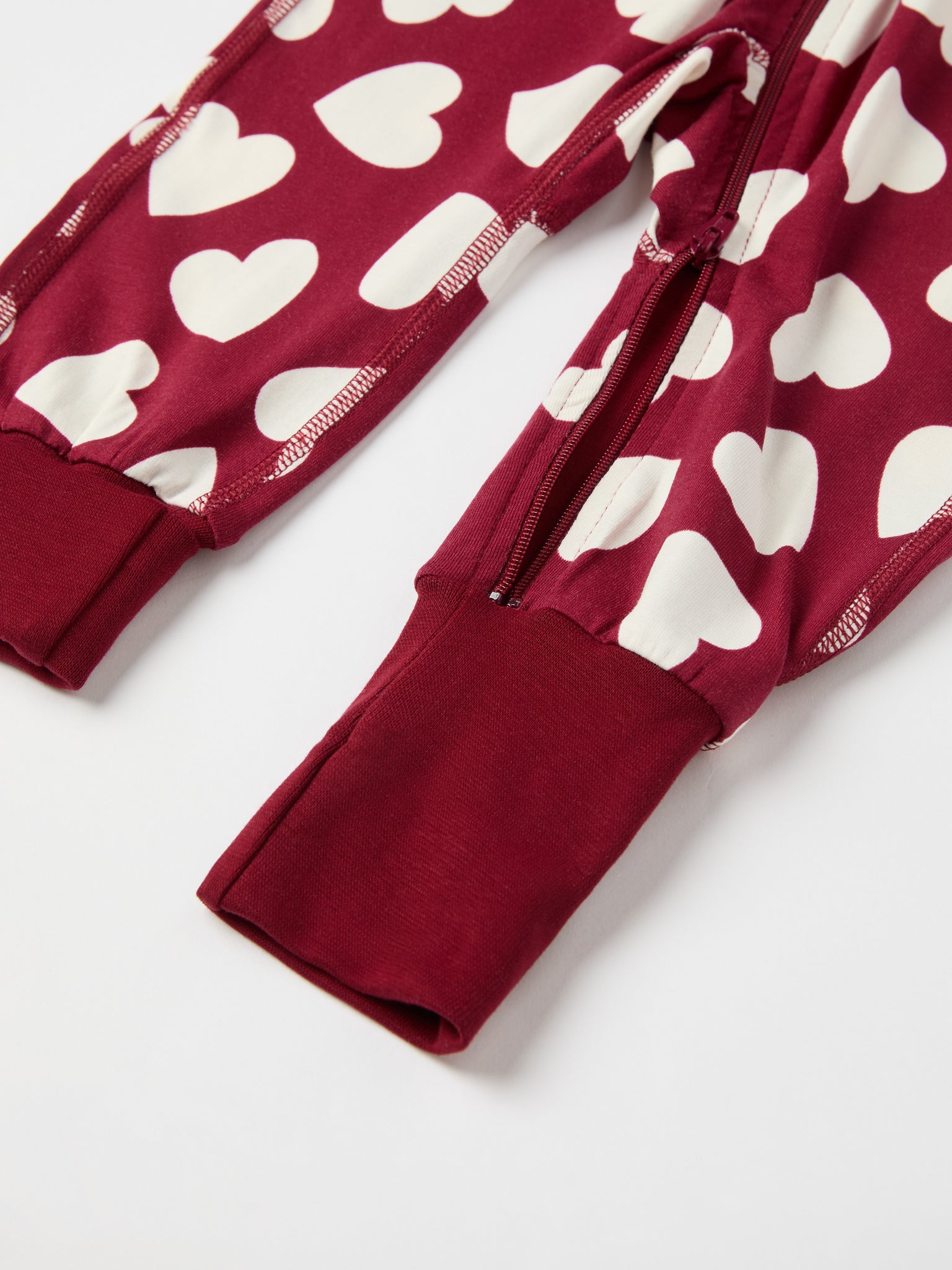 Heart Print Baby Sleepsuit from the Polarn O. Pyret baby collection. Ethically produced kids clothing.