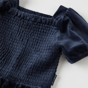 Navy Velour Kids Jumpsuit from the Polarn O. Pyret kidswear collection. Ethically produced kids clothing.