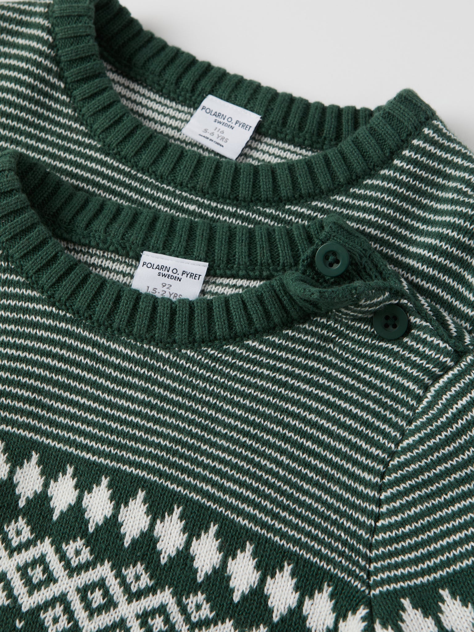 Green Kids Fairisle Jumper from the Polarn O. Pyret kidswear collection. Nordic kids clothes made from sustainable sources.