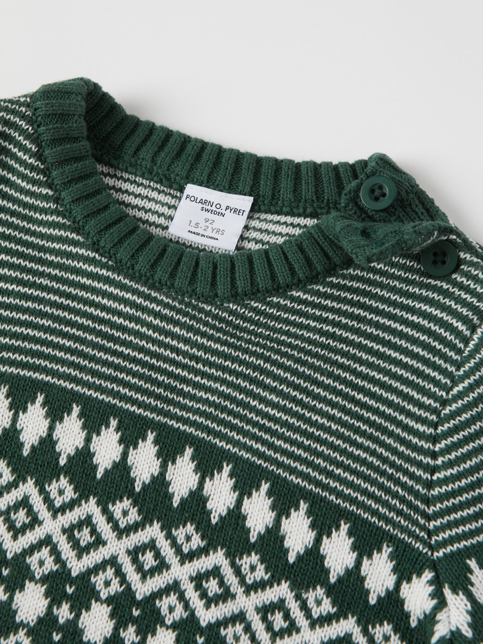 Green Kids Fairisle Jumper from the Polarn O. Pyret kidswear collection. Nordic kids clothes made from sustainable sources.